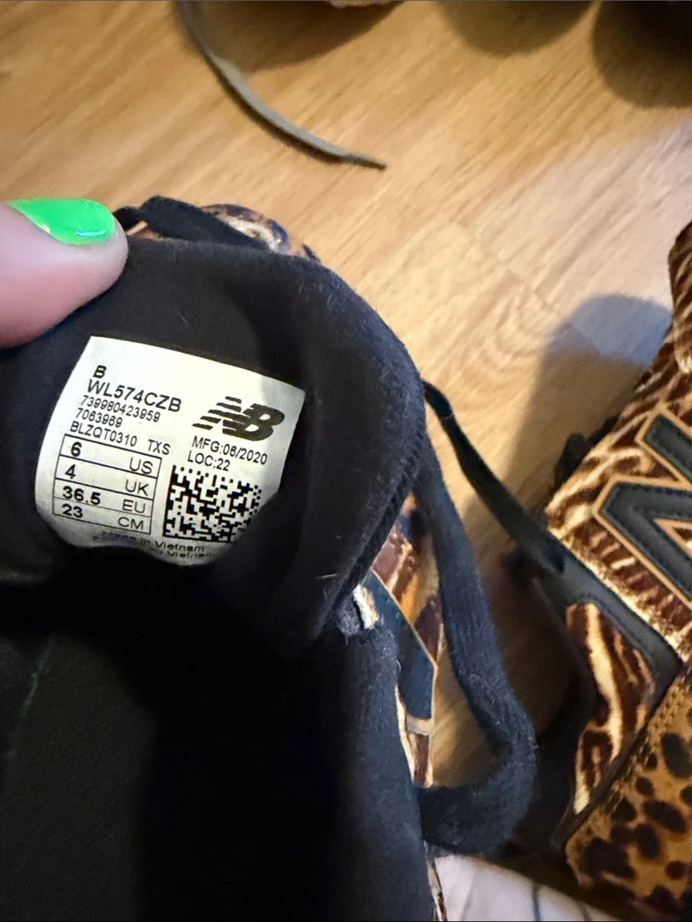 New Balance women’s Leopard-Print Sneakers in Brown and Black
